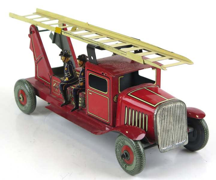 Mekanisk leksak, litograferad plåt, Mettoy, England, 1920-30-tal, brandbil, teleskopstege, 3 brandmän, l 30 cm, obetydligt slitage_25395a_8daf899ef4dd097_lg.jpeg